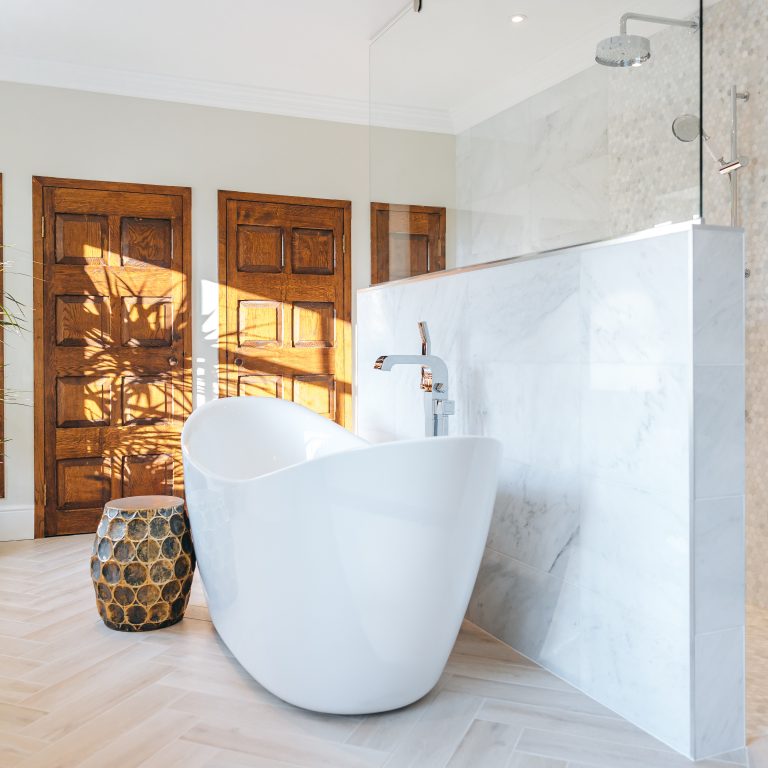Master Bedroom En-Suite with roll top tub and walk in shower